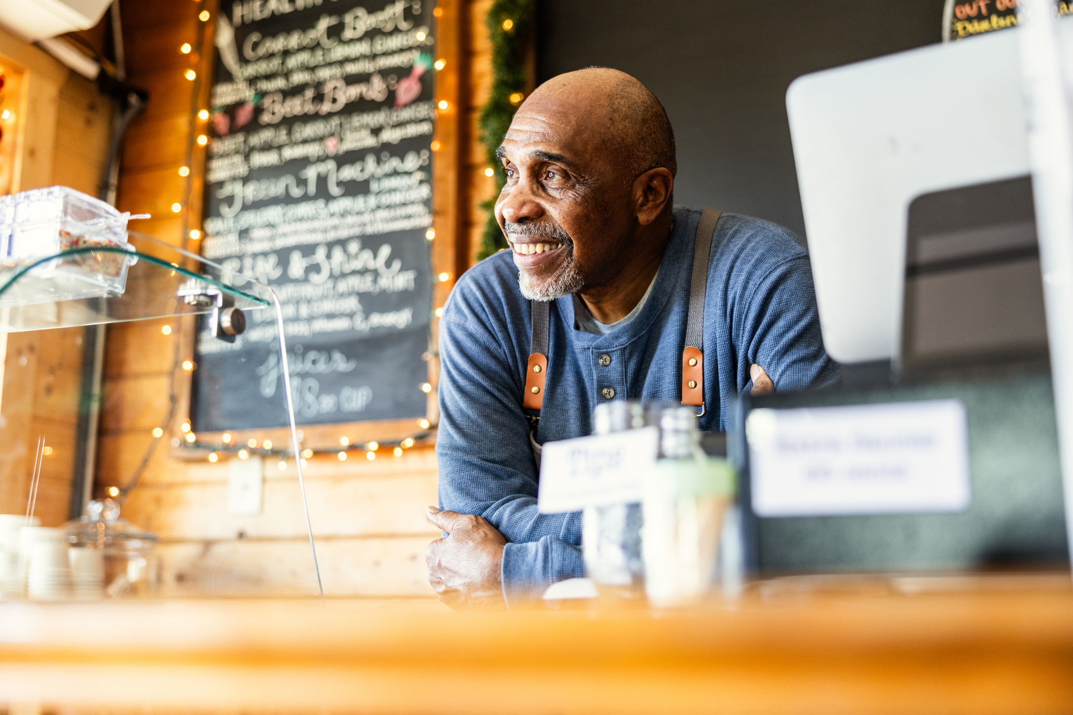Man leaning on counter